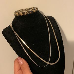 Silver and gold snake chains